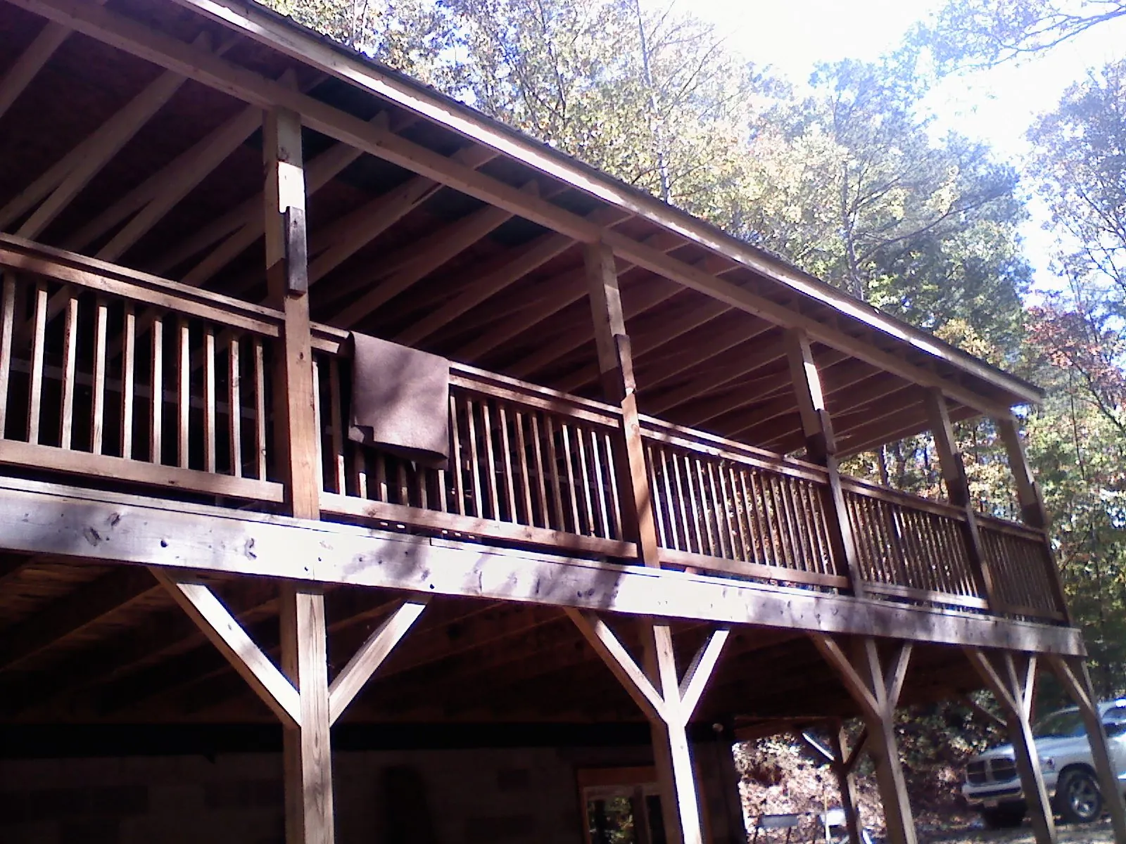 Timber framing under a new elevated porch and deck — Roof Leak Repair in Boylston by Roofing Brothers